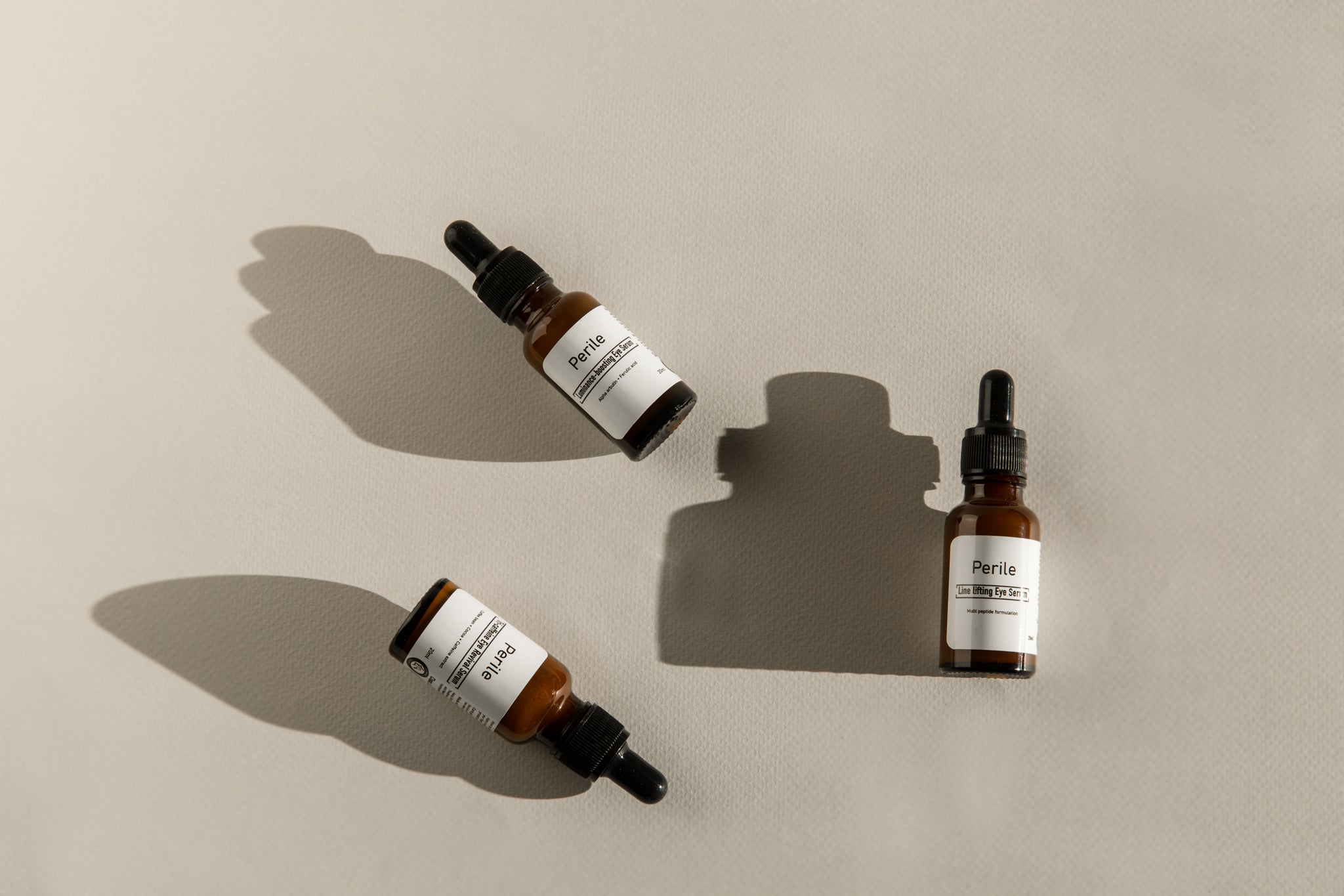 clean, cruelty-free ingredients, a trio of serums targeting puffiness, fine lines, and dullness, brighten, lift, and rejuvenate the delicate eye area, leaving it refreshed and radiant, Tri-Caffeine Eye rrevival Serum, Line Lifting Serum, and Luminance-Boosting Serum.